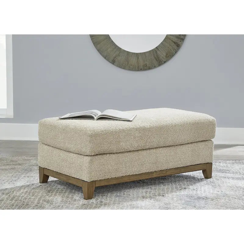 Transitional Upholstered Ottoman with Plush Cushion & Faux Wood Trim, 44"W